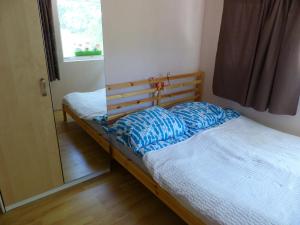 Postel nebo postele na pokoji v ubytování Family Cottage
