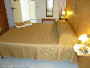 Postel nebo postele na pokoji v ubytování B&B Sunrise + 15 fotografií