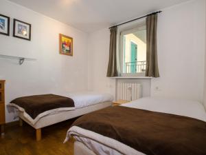 Posteľ alebo postele v izbe v ubytovaní Appartement calme au centre avec terrasse, WiFi, parking - FR-1-343-198