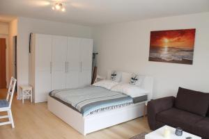 Ένα ή περισσότερα κρεβάτια σε δωμάτιο στο Ostseeappartement K014