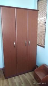 a pair of wooden lockers in a room at Nairi in Sevan