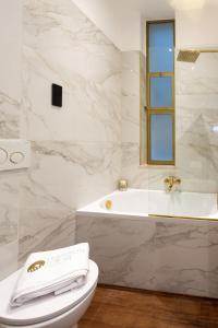 Ванная комната в Maison d'Or