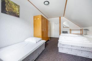 Postel nebo postele na pokoji v ubytování Vakantiehuis Cerny Dul 259