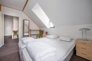 Postel nebo postele na pokoji v ubytování Vakantiehuis Cerny Dul 259
