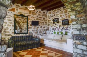 Uma TV ou centro de entretenimento em Villa Peristeri