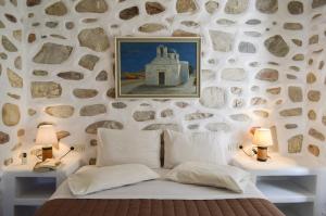 Cama ou camas em um quarto em Villa Peristeri
