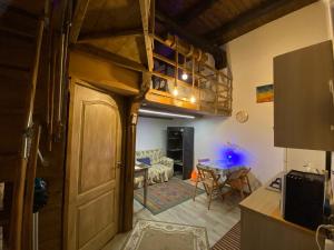 a room with a living room with a loft at Sarno Domus Grazioso Loft 2 livelli Centro Storico in Sarno