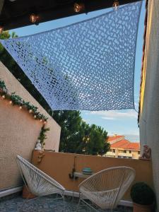 Balkón alebo terasa v ubytovaní Appartement Vintage 90 m2 DUPLEX classé