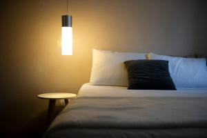 Postel nebo postele na pokoji v ubytování Hotel Internacional