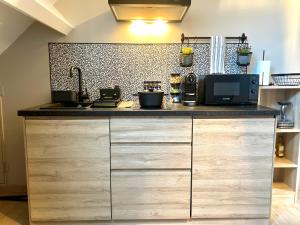 Η κουζίνα ή μικρή κουζίνα στο Chez Roya