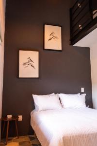 Postel nebo postele na pokoji v ubytování Hostal de la Montaña
