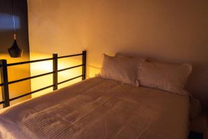 Postel nebo postele na pokoji v ubytování Hostal de la Montaña