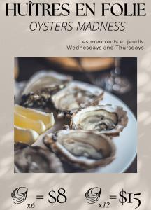 a flyer for a restaurant with oysters on a plate at InterContinental Montreal, an IHG Hotel in Montréal