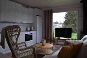 Kuchyň nebo kuchyňský kout v ubytování Villa Riverside