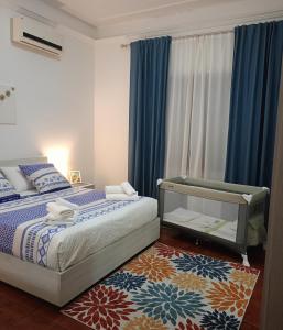 Ένα ή περισσότερα κρεβάτια σε δωμάτιο στο casa vacanze Agugliastra