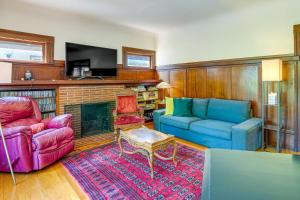 a living room with a couch and chairs and a fireplace at WFH-Friendly Berkeley Home Less Than 2 Mi to University! in Berkeley