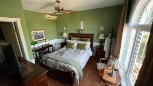Letto o letti in una camera di Gîte du Caméléon