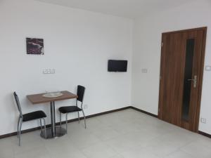 TV a/nebo společenská místnost v ubytování Penzion U Dulíka