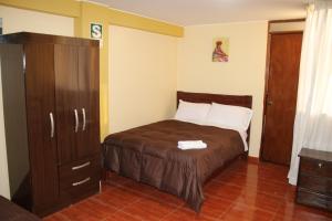 Postelja oz. postelje v sobi nastanitve Pachamama Hostel