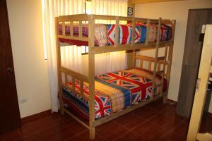 Postelja oz. postelje v sobi nastanitve Pachamama Hostel