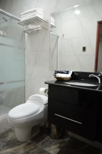 Koupelna v ubytování Altipacha Ayacucho Hotel