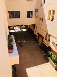 an overhead view of a courtyard in a building at Casablanca Beautiful and Tranquil Family Apartment in Casablanca