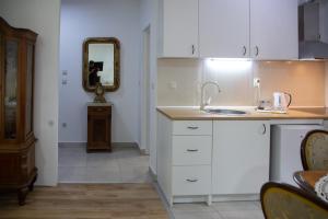 Una cocina o kitchenette en Apartman Centar