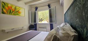 Posteľ alebo postele v izbe v ubytovaní Splendide villa de rêve climatisée avec vue mer & montagne et sa piscine chauffée