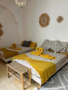 Postel nebo postele na pokoji v ubytování RIAD TIFAWT + 37 fotografií