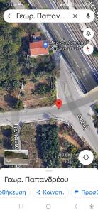 een kaart van een straat met een rood hart bij House Near Airport Pallini Metro Station in Pallíni