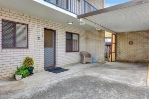 a porch of a house with a patio at Ocean Sands 1 in Sawtell +2 photos