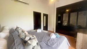 Postel nebo postele na pokoji v ubytování Cozy apartment Golf Course View in Punta Cana