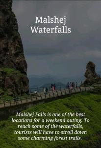 a sign that says making falls is one of the best locations for awored at Tent City Malshej Junnar Tourism & Farm in Otūr