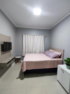 Katil atau katil-katil dalam bilik di Dunas Residence - Casa 10