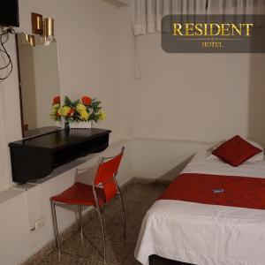 Voodi või voodid majutusasutuse Hotel Resident Piura toas