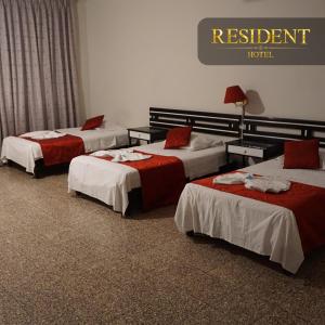 Voodi või voodid majutusasutuse Hotel Resident Piura toas