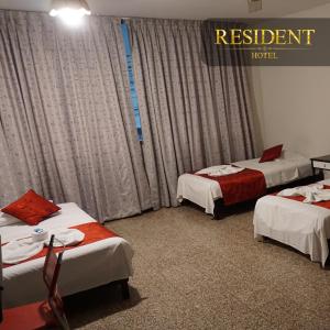 Voodi või voodid majutusasutuse Hotel Resident Piura toas