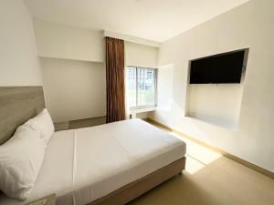 Postel nebo postele na pokoji v ubytování Hotel Zamay Plus