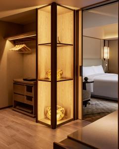 Dusit Thani Kyoto客房内的一张或多张床位