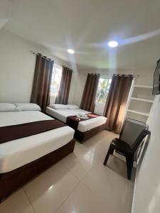 Postel nebo postele na pokoji v ubytování Hotel Playarena