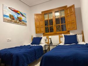 Postel nebo postele na pokoji v ubytování Apartament w Torrevieja