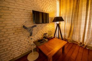 TV a/nebo společenská místnost v ubytování Benjamin Cottage Haputale