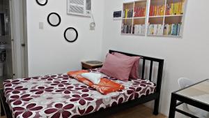 Postel nebo postele na pokoji v ubytování Maria Cristesa Condotel