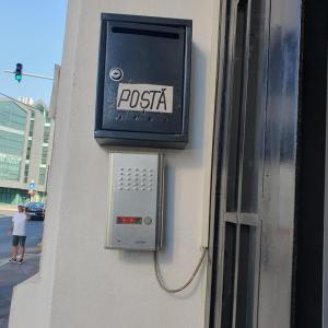 a pisca box on the side of a building at Cazare - Accommodation in Bucharest