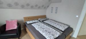 Postel nebo postele na pokoji v ubytování Ferienwohnung Landliebe