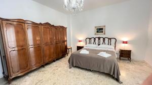 Säng eller sängar i ett rum på Suite 19 by Apulia Accommodation