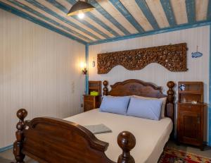 A bed or beds in a room at Container Luxury House