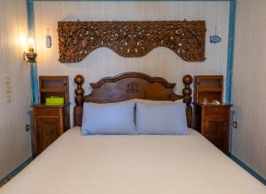 A bed or beds in a room at Container Luxury House