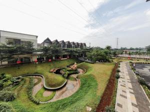 a view of a park with a skateboard at Stay G Service Residence Sentul in Kedungmanggu