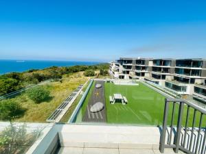 a view from the balcony of a building at Dolce vita luxurious apartment in Umhlanga